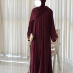 Elegant maroon abaya in TikTok Nida fabric with a glossy, shimmering finish—perfect for weddings and special celebrations.