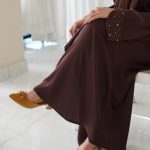 Elegant brown abaya in TikTok Nida fabric with a glossy, shimmering finish—perfect for weddings and special celebrations