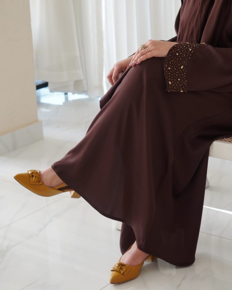 Elegant brown abaya in TikTok Nida fabric with a glossy, shimmering finish—perfect for weddings and special celebrations