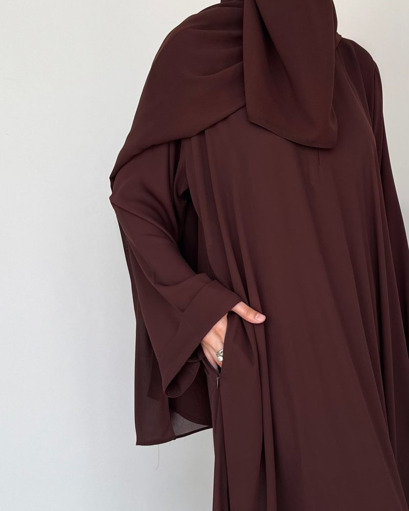 Brown everyday abaya with pockets, made from breathable fabric for comfortable daily wear.