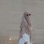 3-layer chiffon khimar in lightweight fabric, offering full coverage with elegant layered design.