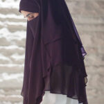3-layer chiffon khimar in lightweight fabric, offering full coverage with elegant layered design.