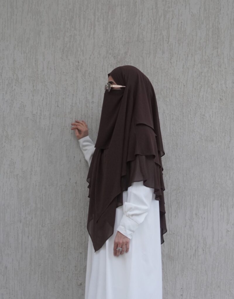 3-layer chiffon khimar in lightweight fabric, offering full coverage with elegant layered design.